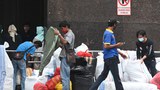 ID-economy-covid-traders620.jpg