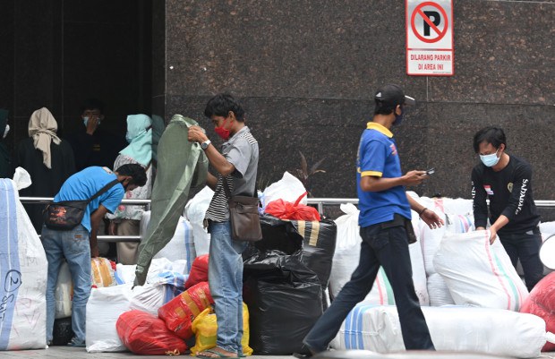ID-economy-covid-traders620.jpg ID-economy-covid-traders620.jpg