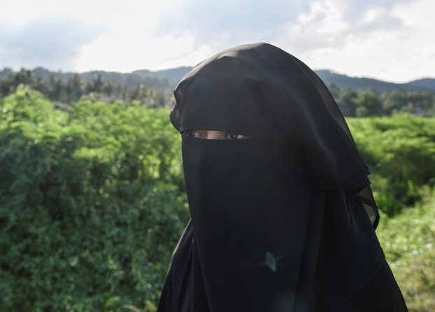 Aisyah bergambar di luar rumah ibunya di Terengganu, Malaysia, 22 Mei 2019. [S. Mahfuz/BeritaBenar]